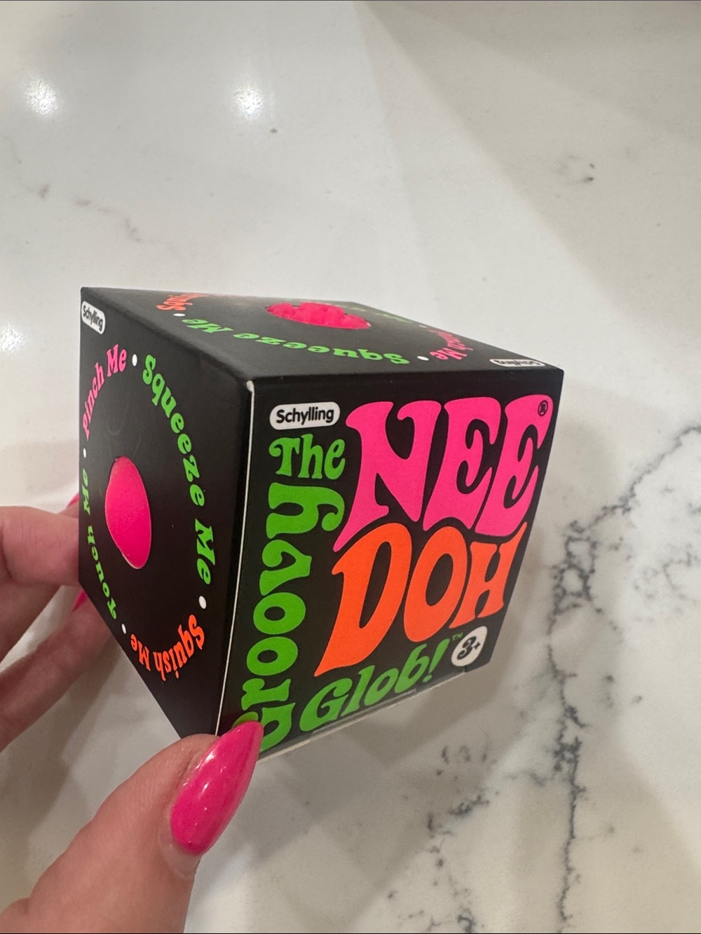 Schylling The Nee Doh Squeezy Globe Toy - pink